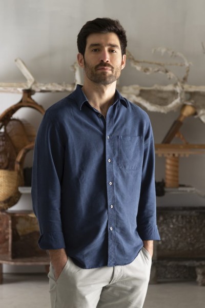 portrait-of-kostas-lambridis-in-front-of-its-not-enough-1-p4hq4bost17sfy9ua3uki31r2uinla64irskpv53j6.jpg