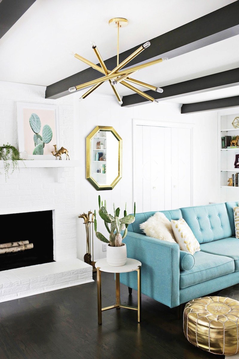a-gold-coffee-table-with-blue-couch.jpg
