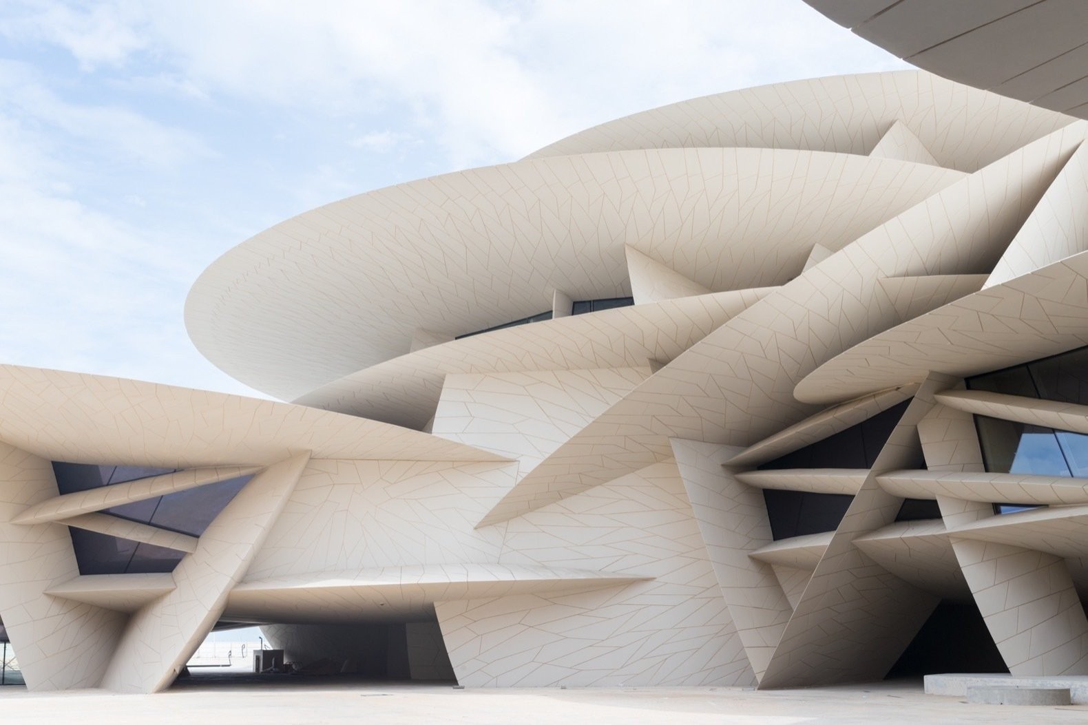 the-building-design-is-inspired-by-the-desert-rose-rock-formation-that-occurs-when-minerals-crystallize-in-crumbly-soil-just-below-the-surface-of-a-shallow-salt-basin.jpg the-building-design-is-inspired-by-the-desert-rose-rock-formation-that-occurs-when-minerals-crystallize-in-crumbly-soil-just-below-the-surface-of-a-shallow-salt-basin.jpg