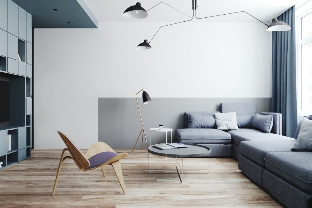blue-color-block-living-room-with-metal-industrial-lighting-and-scandinavian-accent-chair-1024x683.jpg